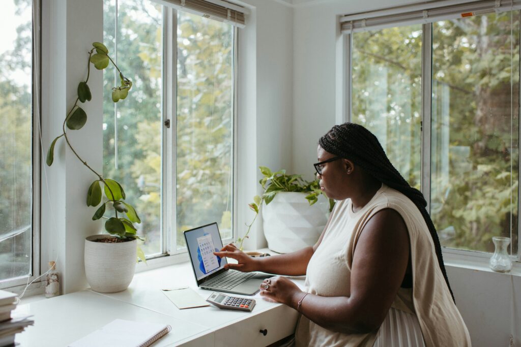 woman studies on laptop