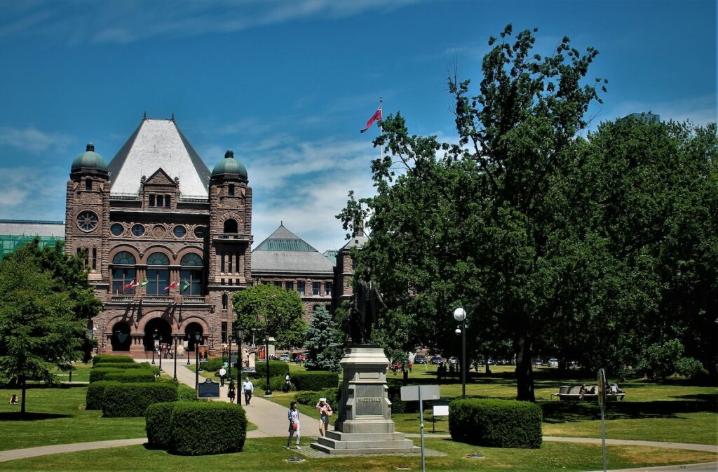 students walk on paths on university campus