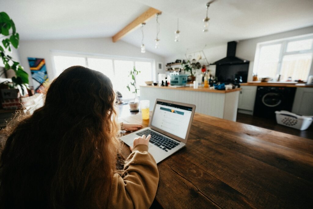 girl studying at laptop