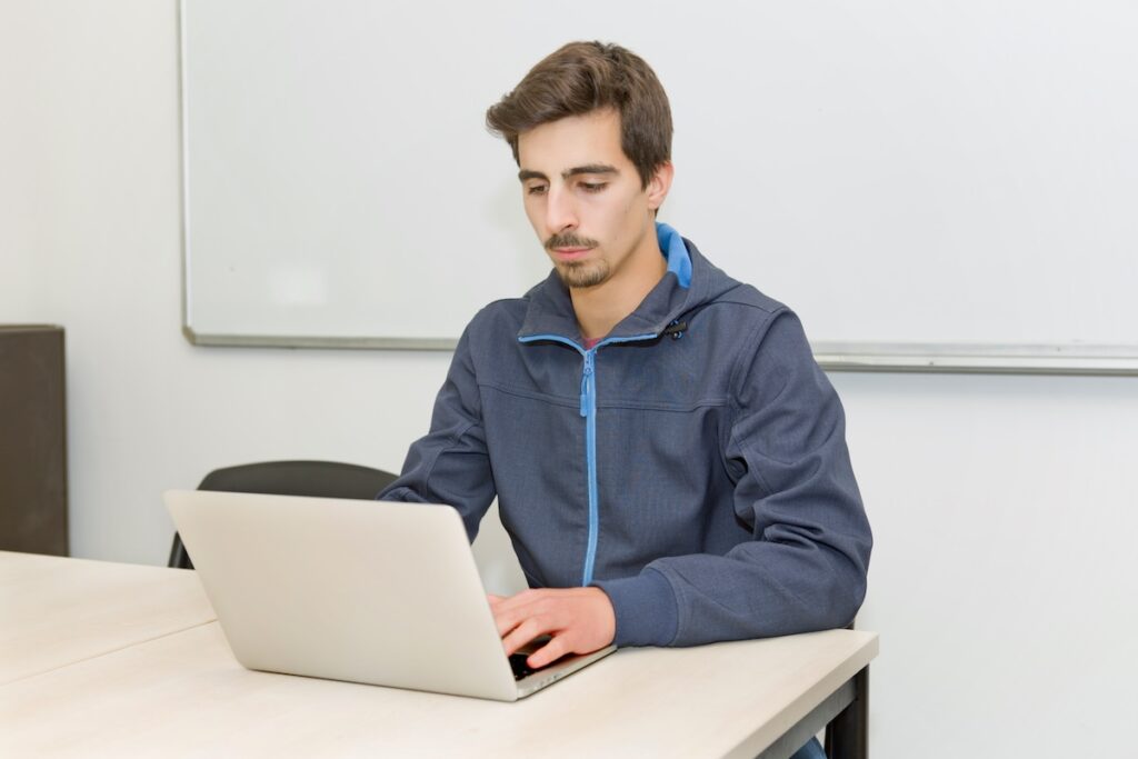 young casual student in the classroom