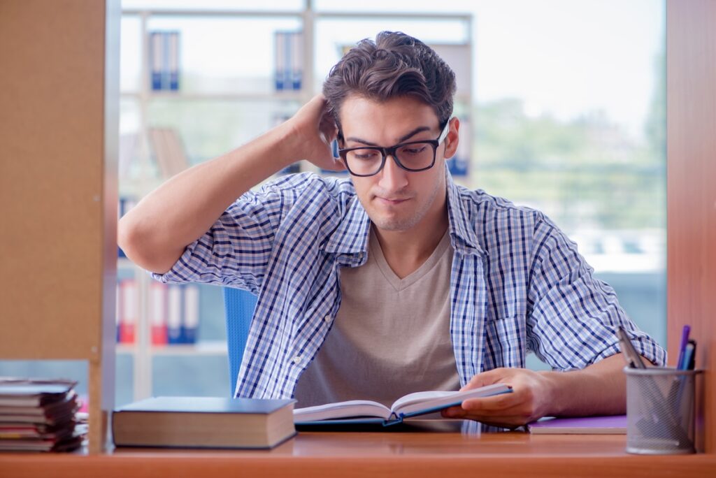 Student studying at home preparing for exam