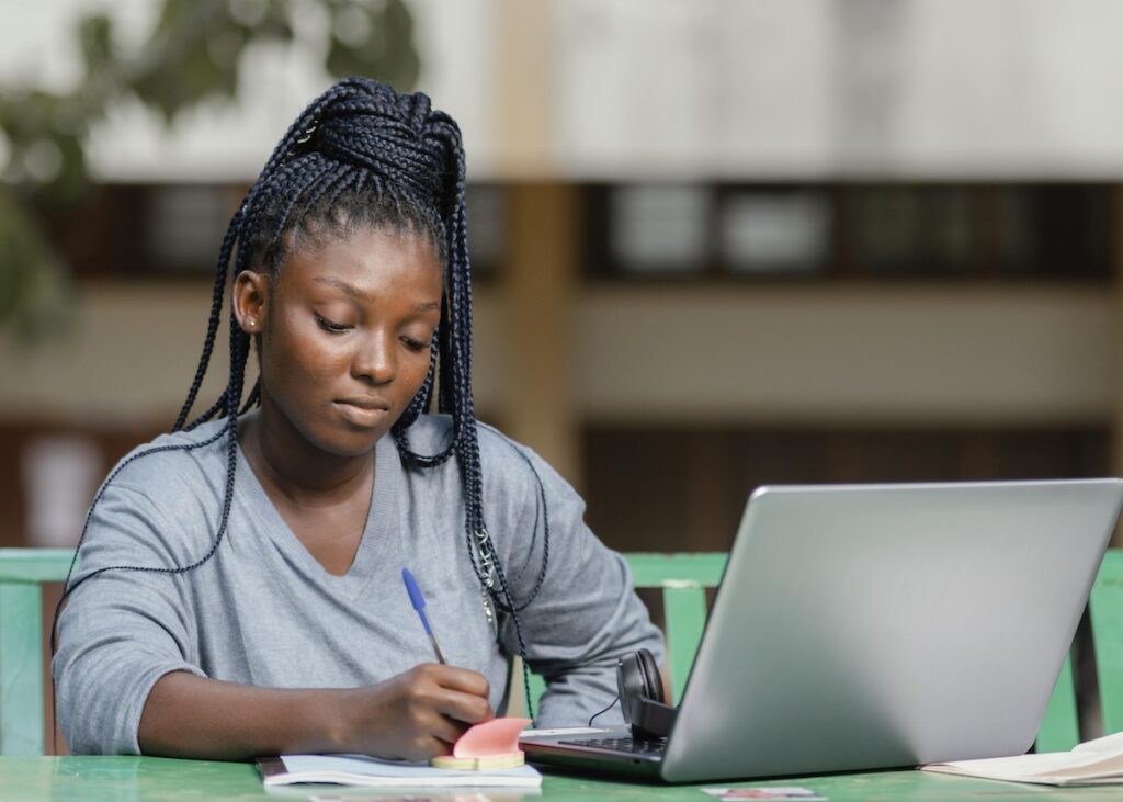 medium shot hard working student
