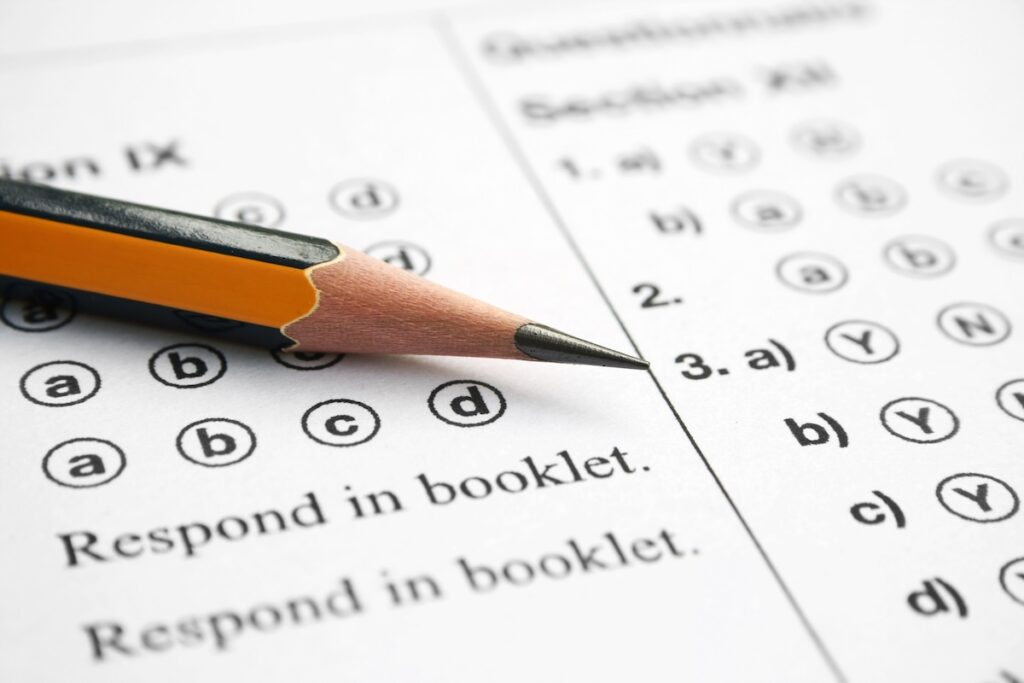 SAT bubble sheet with a pencil on top of it