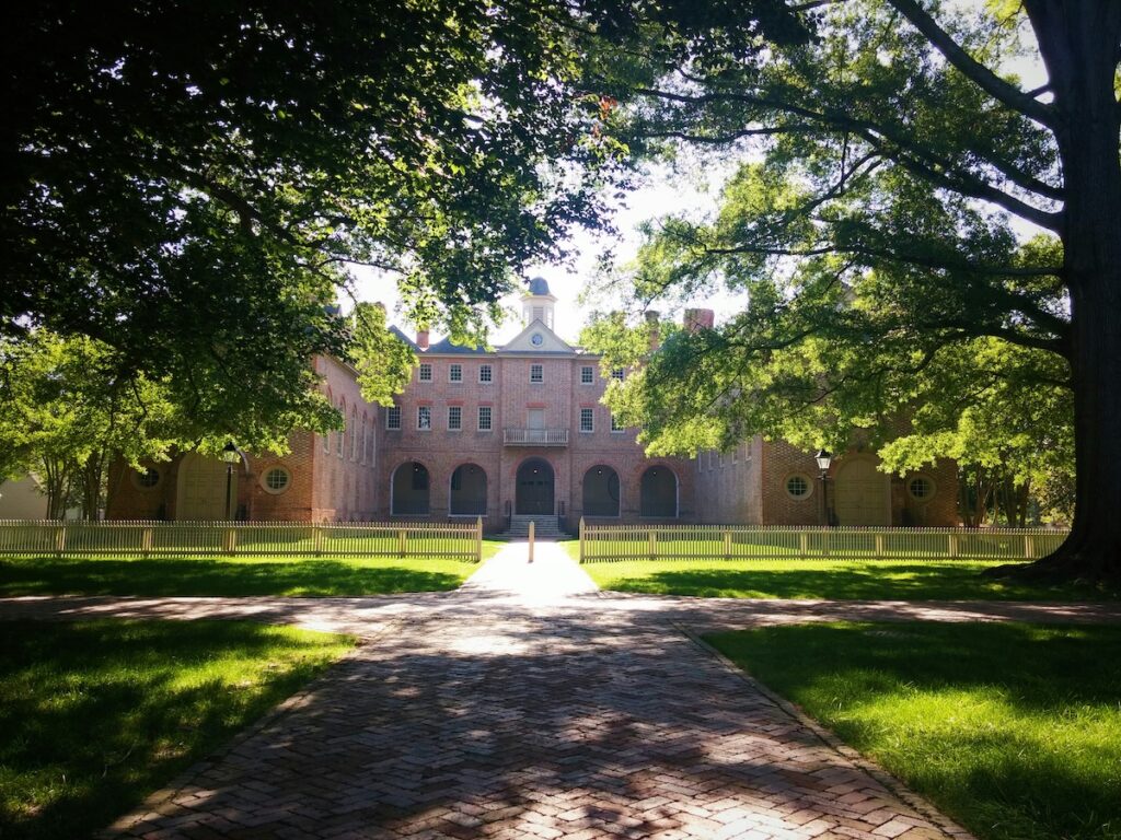 architectural college building surrounded by trees