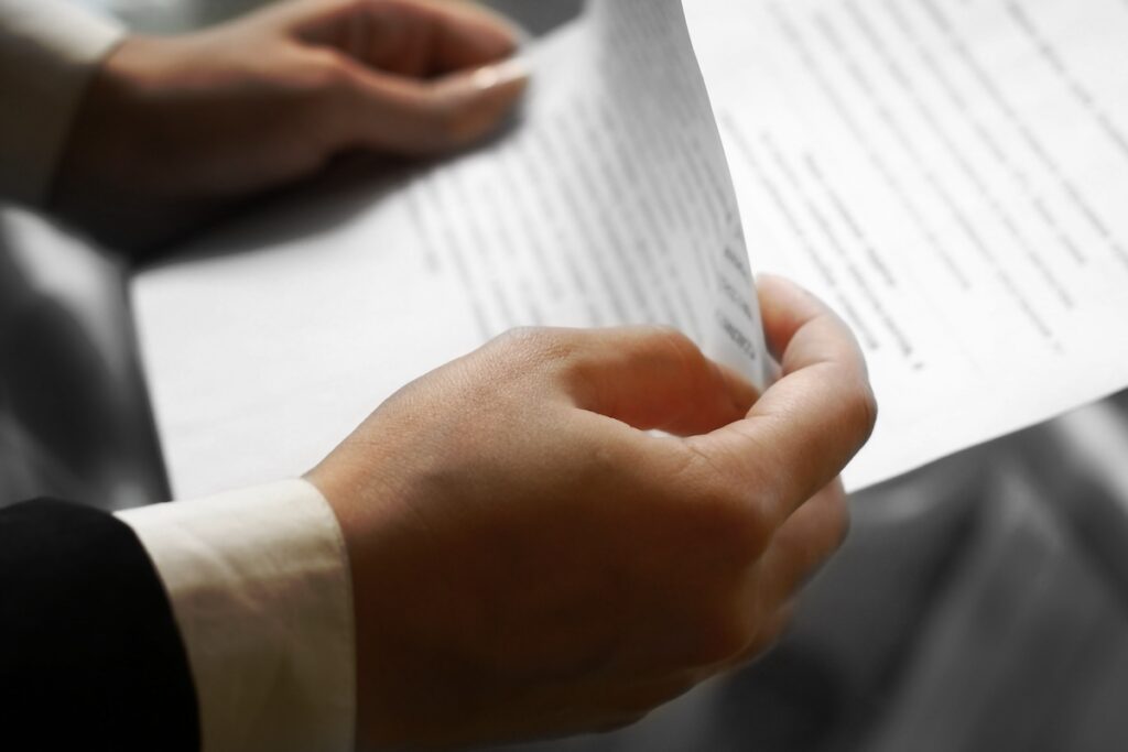 man reviewing a letter