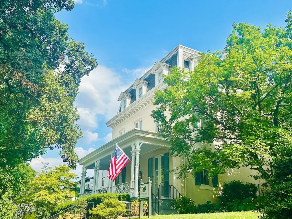 historic building at georgetown university campus surrounded by green trees