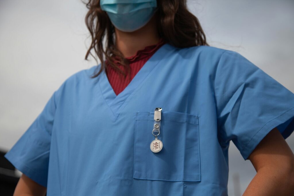 woman wearing blue scrubs