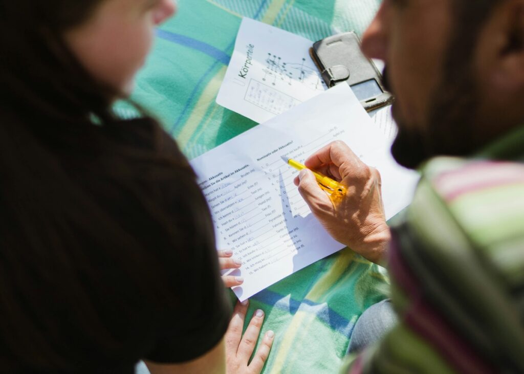 student works with tutor to learn a language