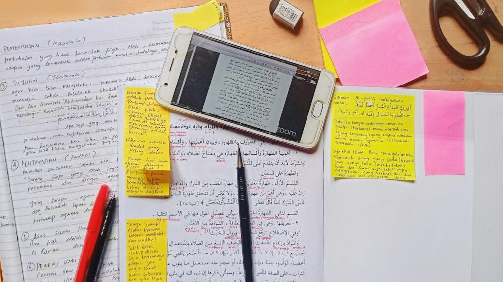 flatlay of essay papers and notes