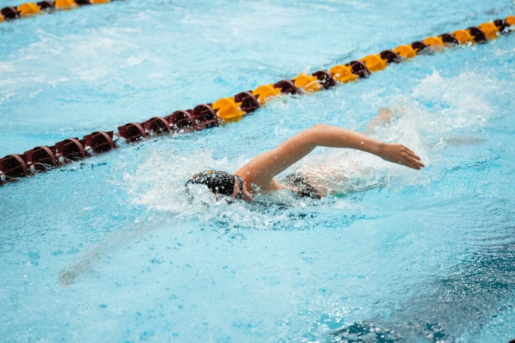 swimmer in a swimming lane in a pool