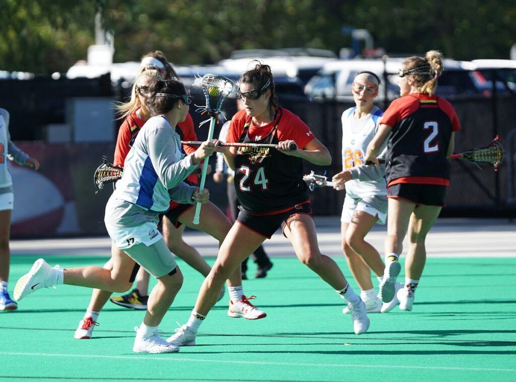 female field hockey players in a match