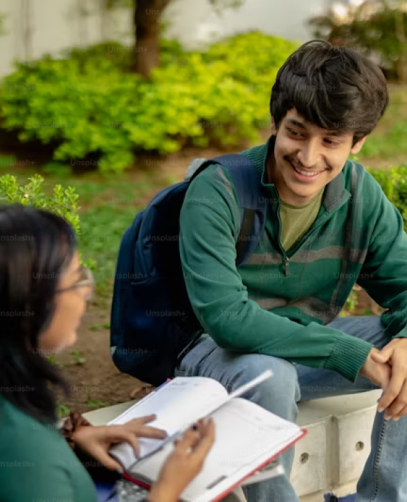 Happy student on the grass