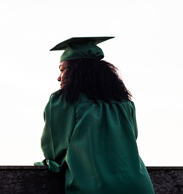 Student in green robe