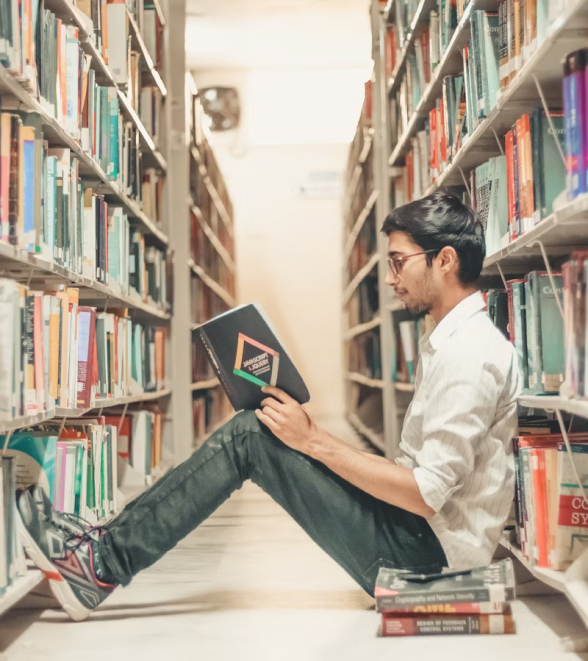 Student reading in the library