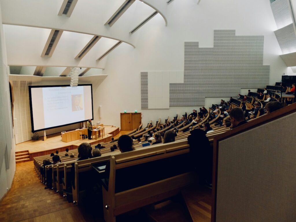 looking down over theatre-style seats in a university lecture hall