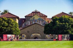 outdoor platform set up in front of beautiful stone building at Stanford University
