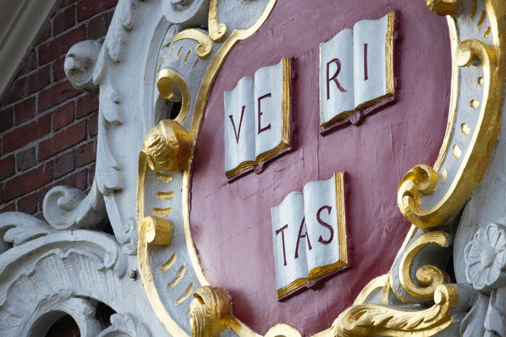 Harvard University seal and motto "VERITAS"